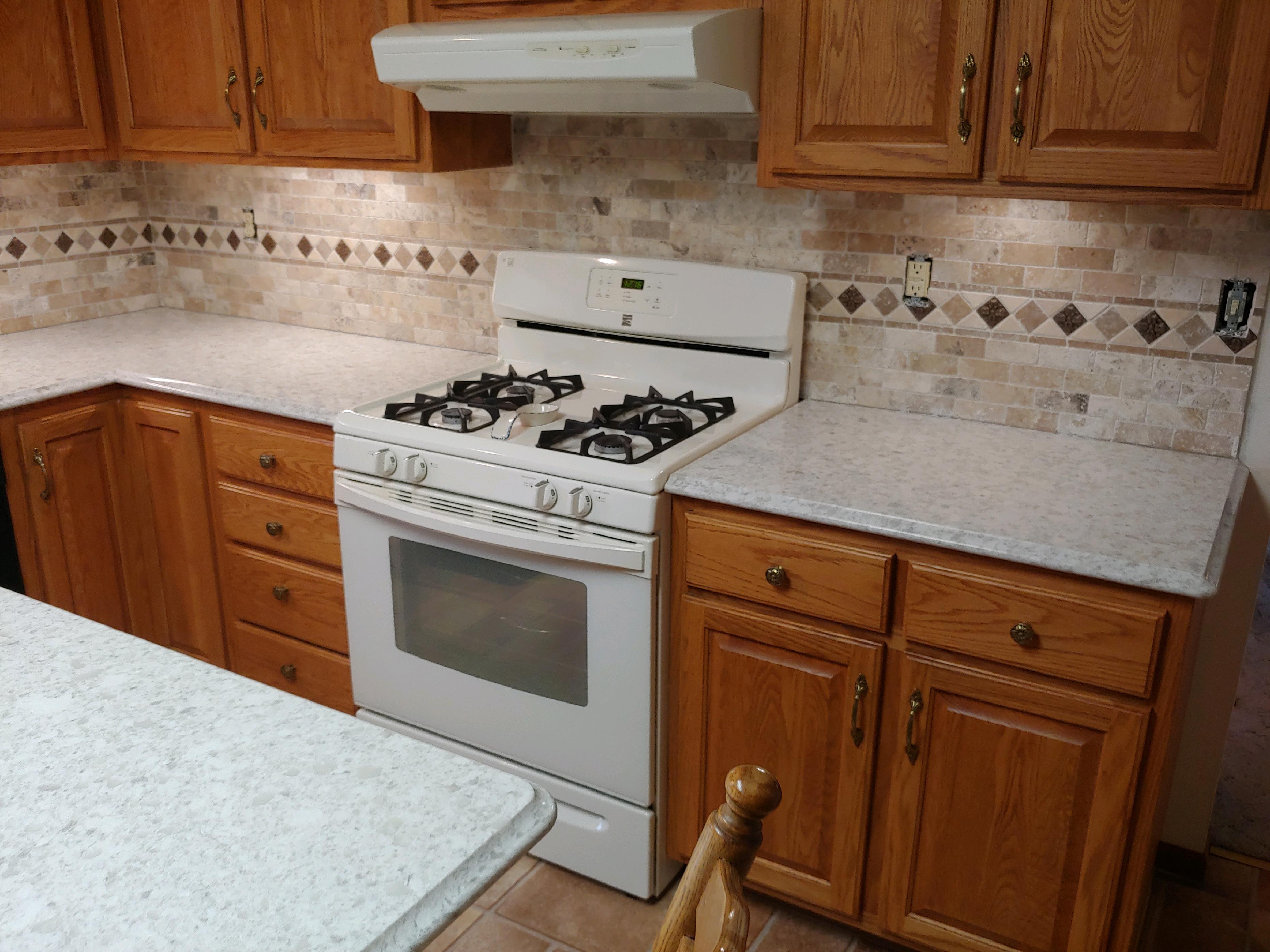 Quartz Replacement & Tile Backsplash Installation Nau Construction, Inc